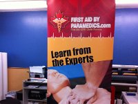 First Aid By Paramedics  Designed and printed retractable banner